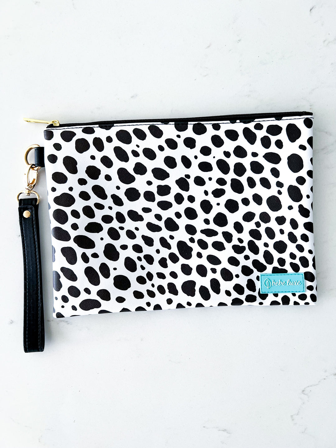 Bebe high quality patent leather clutch.